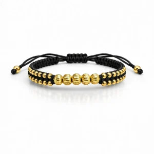 Pulsera en oro laminado con balines diamantado y tejido negro, diseño elegante, ajustable y de joyería premium para mujer
