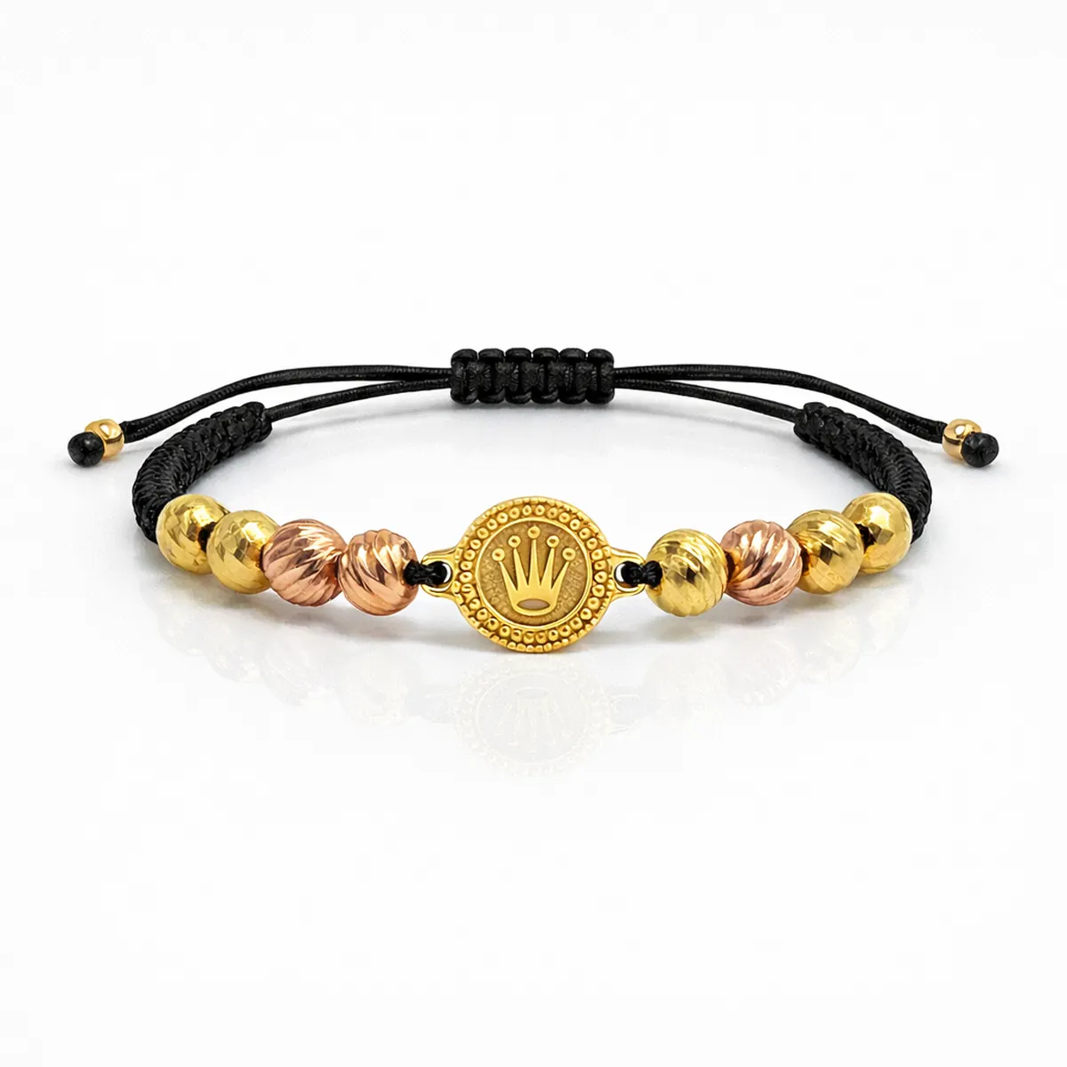 Pulsera RX diamantada #8 en oro laminado con balines diamantados bicolor, dije central y ajuste en nailon negro.